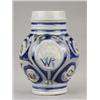 Image 1 : A Westerwald stoneware jug, of bulbous form, moulded with crown and WR in an oval panel, moulded...