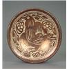 Image 1 : A red lustre Hispano Moresque circular dish, boldly decorated overall with a bird with spread win...