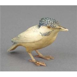 A Japanese ivory carving of a kingfisher, with coloured plumage and detail, 3.5in long, 20th cent...