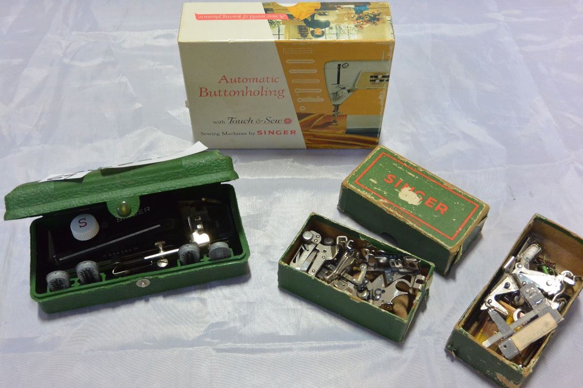 FOUR VINTAGE SINGER SEWING MACHINE PARTS
