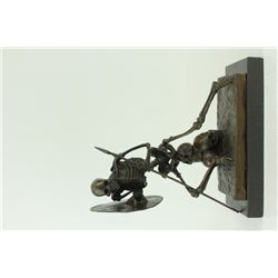 Eerie Sculpture Of A Skeleton Warrior on marble base