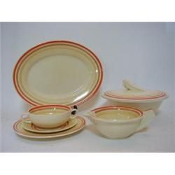 CLARICE CLIFF BIZARRE DINNER WARES, two tureens/covers, three oval platters, six twin handled bow...
