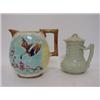 Image 1 : A MAJOLICA PITCHER, late 19th Century, moulded fan and stork design in the Aesthetic manner, turq...