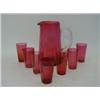 Image 1 : A RUBY GLASS WATER JUG, clear loop handle, with seven matching beakers (8)  50-80...