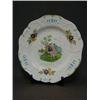 Image 1 : A MINTONS CREAMWARE PLATE, late 19th Century, moulded scrollwork border with over-enamelled trans...
