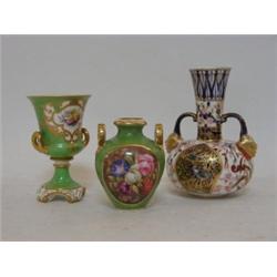 A CROWN DERBY TWIN HANDLED VASE, late 19th Century, Imari design with birds on branches, a floral...