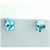 Oval 3ct TW Sky Blue Topaz Stud Earrings