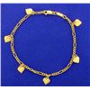 Image 1 : 7 Inch Figaro Bracelet with Dangling Hearts