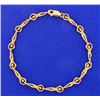 Image 1 : Unique Gold Acrobat Bracelet