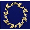 Image 1 : 8 Inch Dolphin Link Bracelet in 14k Gold