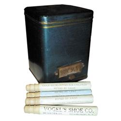 Tin box of "Vogel Shoes" wooden whistles.