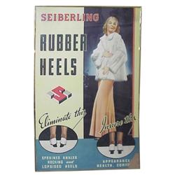 Litho on cdbd. sign for "Seiberling Rubber Heels." 24”W x 36”H.