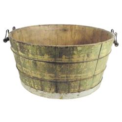 Primitive wooden wash tub w/old green paint & handles, 25"Dia.
