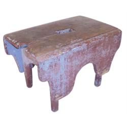 Blue & oxblood red painted bench w/slot in top, very old, 19"W x 12"H.