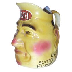Figural china tankard for "O.V.H." whiskey, "The Assoc. Potteries Co." Some paint loss, 6"H.