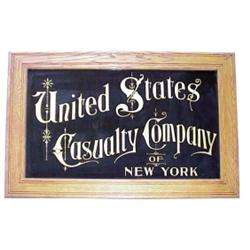 Framed reverse paint on glass for "United States Casualty Co., NY,” 35"W x 24"H.