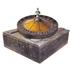 Roulette wheel, marked Albert Pick, 23" Dia., with wheel crate, legs & stretcher. C.1910.