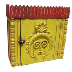 Contemporary "Folk Art" hanging cupboard w/face motif & fence crown, red/mustard paint, 26"W x 25"H.