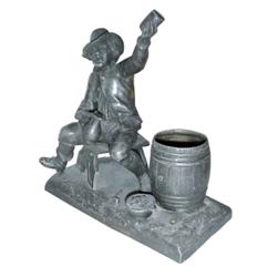 Figural cigar holder/lighter.  Man drinking ale.  C. 1900. 8 H.