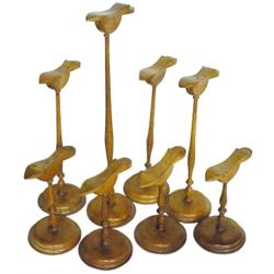 Eight wooden shoe display stands, five are adjustable, 9-22 H.