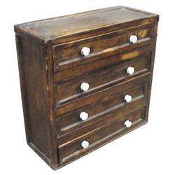 4 drawer miniature chest w/porc. knobs, 8" H.