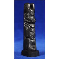 Haida Argillite Totem Carved with Grizzly Bear Holding a Human by Medric Jones 1973  4 1/2" H.  Good
