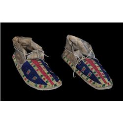 Pair of Beaded Moccasins with Geometric Design and Painted Parfleche Soles ca. 1890  10 1/2" L.  Goo