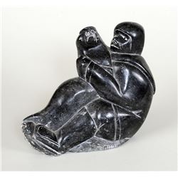 Inuit Soapstone Sculpture of a Boy with a Seal 8 x  6 1/2   Good Condition