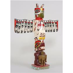 Moses Alexcee Carved Totem with Thunderbird and Bear Holding Human - Port Simpson, B.C. 17 1/2" H. 1