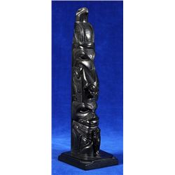Rufus Moody Argillite Totem Carved with Eagle, Raven Holding a Frog and Wasco Holding a Whale 10 1/2