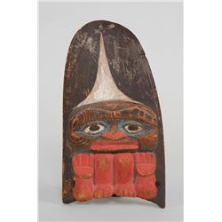 Northwest Coast Carved Dorsal Fin in the Form of a Shaman ca. 1880  8" H. 4 1/2" W.  Good Condition
