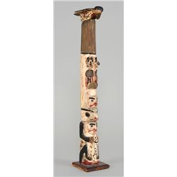 Tlingit Totem Carved with Six Figures with Bird Finial ca. 1920  17" H. 3" W.  Good Condition