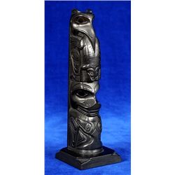 Rufus Moody Argillite Totem Carved with Raven Holding Frog and a Wasco 8 3/4" H. 2 3/8" W. 2 3/8" De