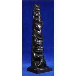 Claude Davidson Argillite Totem Carved with Bear, Raven Holding Sun and Bear with Frog 11" H. 3" W. 