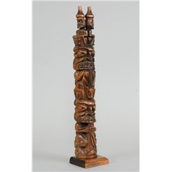 Northwest Coast Totem Carved with Shaman, Bear Holding Frog and Bear Holding Porpoise with Two Watch