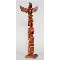 Northwest Four Figure Totem by M.A. Brown 24 1/2" H. 9" W.  Good Condition