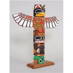 Northwest Coast Totem Carved with Thunderbird, Bear Holding Human and a Frog by Rick Williams 17" H.