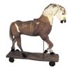 Image 1 : Hide covered well-loved riding horse, burlap body & metal wheels, 28"L.
