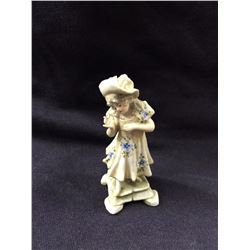 ANTIQUE PORCELAIN FIGURINE