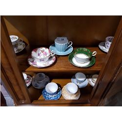 2 SHELVES OF 11 TEACUPS