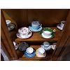 Image 1 : 2 SHELVES OF 11 TEACUPS