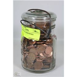JAR FULL OF LOOSE PENNIES