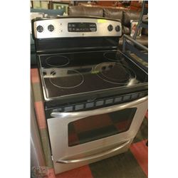 GENERAL ELECTRIC CERAMIC TOP STOVE WITH  SELF