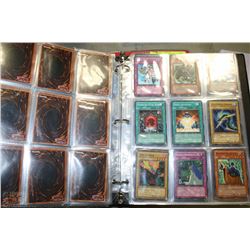 ALBUM OF 180 VINTAGE YU-GI-OH TRADING CARDS