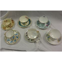 SIX BONE CHINA TEA CUPS AND SAUCERS