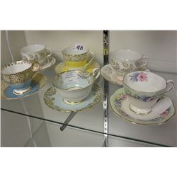 SIX BONE CHINA TEA CUPS AND SAUCERS