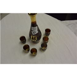 AMBER AND GUILT DECORATED DECANTER SET