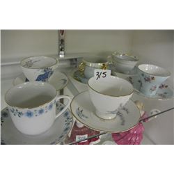 SIX BONE CHINA TEA CUPS AND SAUCERS