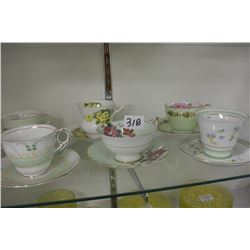 SIX BONE CHINA TEA CUPS AND SAUCERS