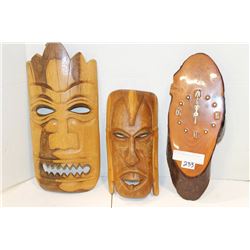 TWO WOOD MASKS AND BURL CLOCK